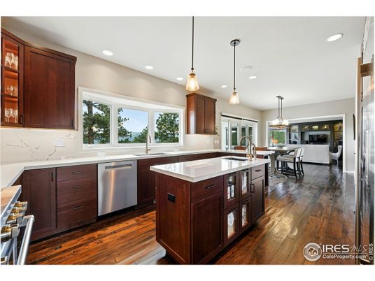 Dining room, Interior, Kitchen, Pendant Lights, Recessed Lighting, Stainless Steel Appliances, Wood Texture Flooring