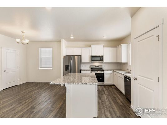 Chandelier, Interior, Kitchen, Recessed Lighting, Stainless Steel Appliances, Wood Texture Flooring