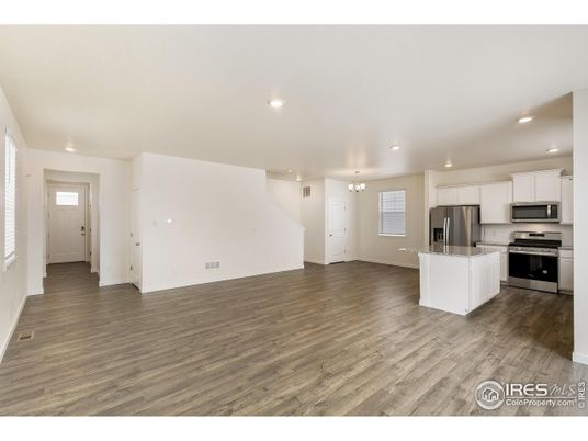 Chandelier, Interior, Kitchen, Recessed Lighting, Stainless Steel Appliances, Wood Texture Flooring