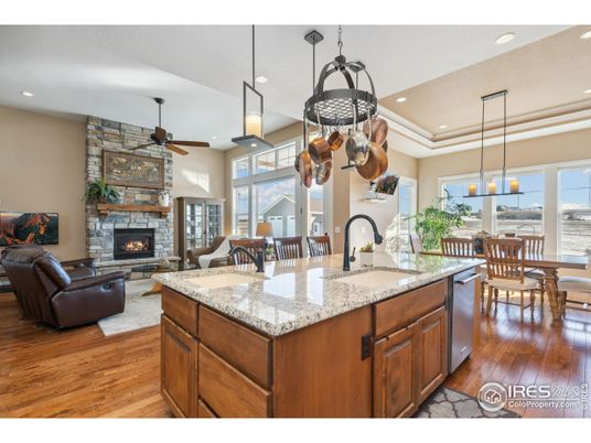 Dining room, Fireplace, Interior, Kitchen, Living room, Pendant Lights, Recessed Lighting, Stone Walls, Wood Texture Flooring