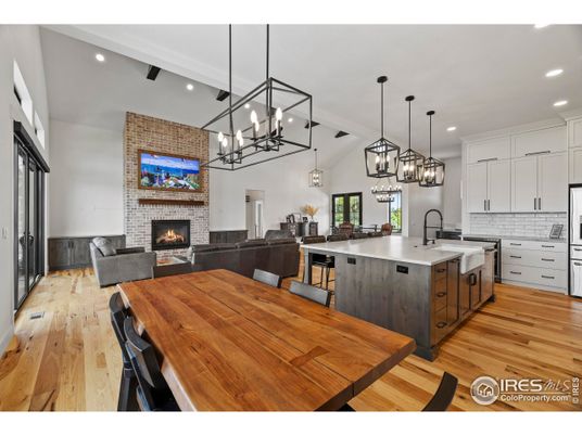 Dining room, Fireplace, Interior, Kitchen, Living room, Pendant Lights, Recessed Lighting, Stone Walls, Wood Texture Flooring