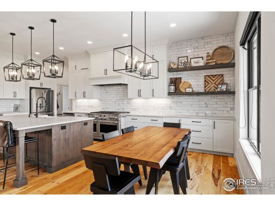 Interior, Kitchen, Pendant Lights, Recessed Lighting, Stainless Steel Appliances, Stone Walls, Wood Texture Flooring