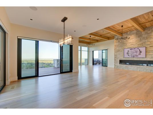 Empty room, Fireplace, Interior, Pendant Lights, Stone Walls, Wooden Beams, Wooden Ceilings, Wood Texture Flooring