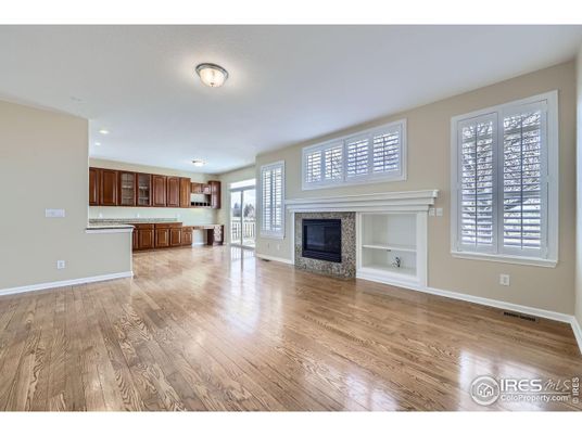 Empty room, Fireplace, Interior, Kitchen, Recessed Lighting, Wood Texture Flooring