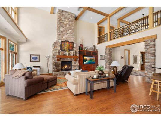 Fireplace, Interior, Living room, Recessed Lighting, Stone Walls, Wooden Beams, Wood Texture Flooring