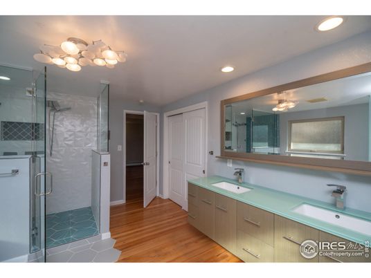 Bathroom, Dual Sink Vanities, Glass Shower, Interior, Recessed Lighting, Wood Texture Flooring