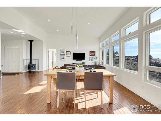 Dining room, Fireplace, Interior, Pendant Lights, Recessed Lighting, Wood Texture Flooring
