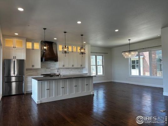 Chandelier, Interior, Kitchen, Pendant Lights, Recessed Lighting, Stainless Steel Appliances, Wood Texture Flooring