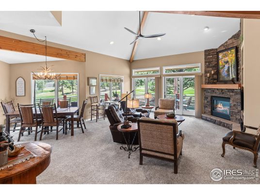 Dining room, Fireplace, Interior, Living room, Recessed Lighting, Stone Walls, Wooden Beams