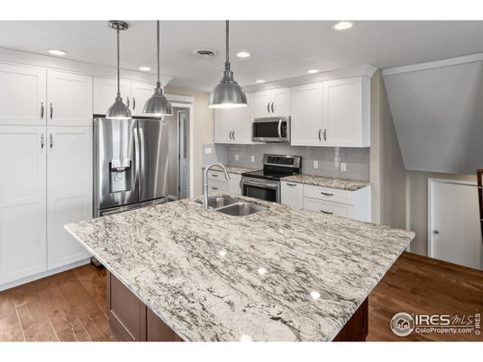 Interior, Kitchen, Pendant Lights, Recessed Lighting, Stainless Steel Appliances, Wood Texture Flooring