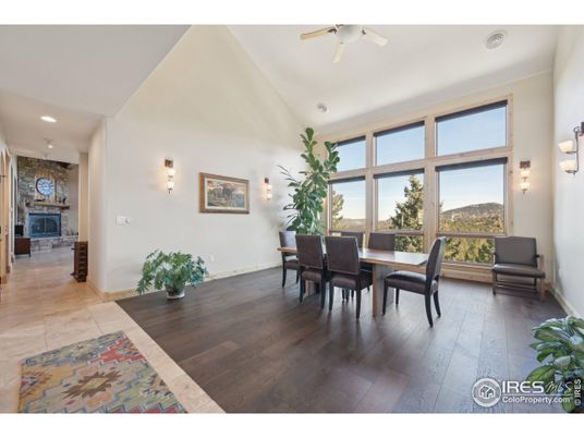 Dining room, Fireplace, Interior, Recessed Lighting, Stone Walls, Wood Texture Flooring