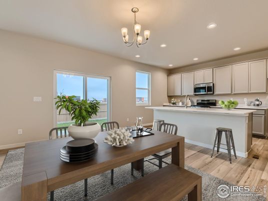 Chandelier, Dining room, Interior, Kitchen, Recessed Lighting, Stainless Steel Appliances, Wood Texture Flooring