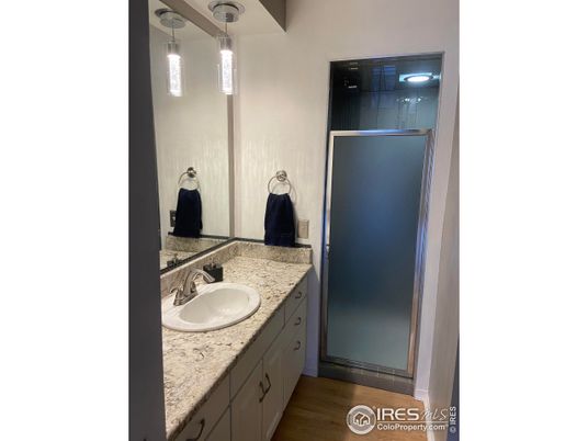 Bathroom, Dual Sink Vanities, Interior, Pendant Lights, Wood Texture Flooring