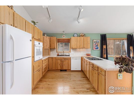Interior, Kitchen, Tile Countertops, Wood Texture Flooring