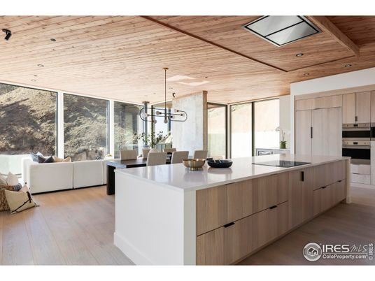 Dining room, Interior, Kitchen, Living room, Pendant Lights, Recessed Lighting, Stainless Steel Appliances, Wooden Ceilings, Wood Texture Flooring