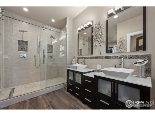 Bathroom, Dual Sink Vanities, Glass Shower, Interior, Recessed Lighting, Wood Texture Flooring