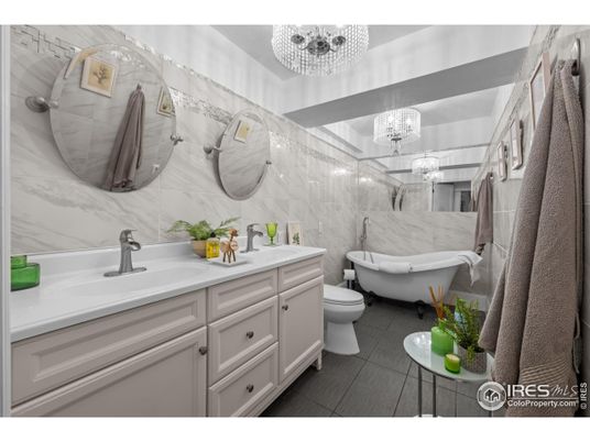 Bathroom, Chandelier, Dual Sink Vanities, Interior, Marble Walls