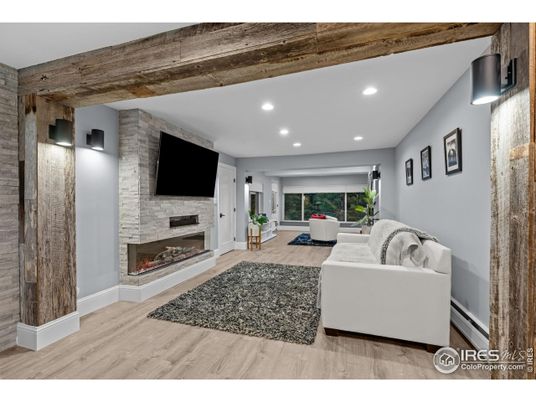 Fireplace, Interior, Living room, Recessed Lighting, Stone Walls, Wooden Beams, Wood Texture Flooring