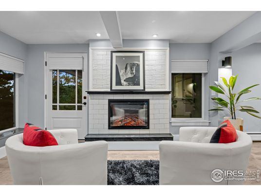 Fireplace, Interior, Living room, Recessed Lighting, Stone Walls, Wood Texture Flooring