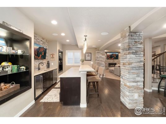 Dining room, Fireplace, Interior, Kitchen, Pendant Lights, Recessed Lighting, Stone Walls, Wood Texture Flooring