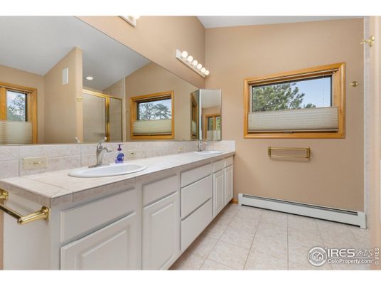 Bathroom, Dual Sink Vanities, Interior, Recessed Lighting, Tile Countertops