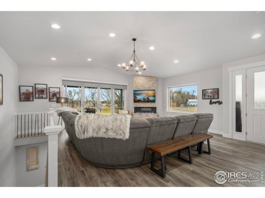Chandelier, Fireplace, Interior, Living room, Recessed Lighting, Wood Texture Flooring