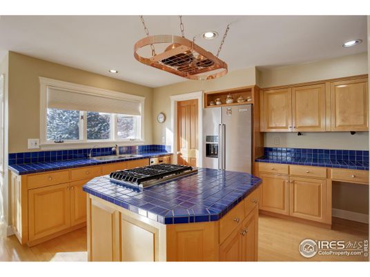 Interior, Kitchen, Recessed Lighting, Stainless Steel Appliances, Tile Countertops, Wood Texture Flooring