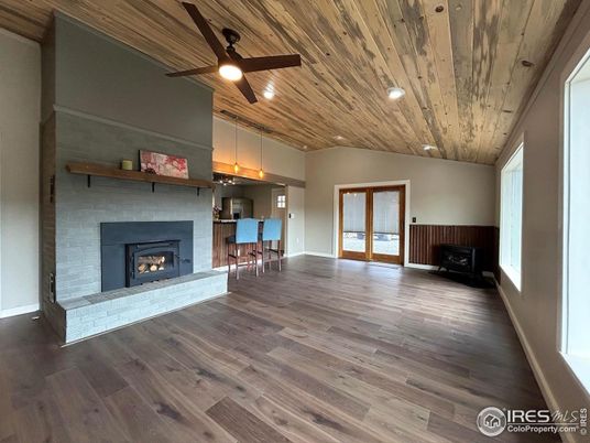 Fireplace, Interior, Pendant Lights, Recessed Lighting, Wooden Ceilings, Wood Texture Flooring