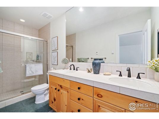 Bathroom, Dual Sink Vanities, Glass Shower, Interior, Recessed Lighting, Tile Countertops