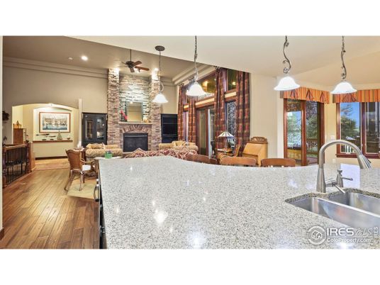 Dining room, Fireplace, Interior, Kitchen, Living room, Pendant Lights, Recessed Lighting, Stone Walls, Wood Texture Flooring