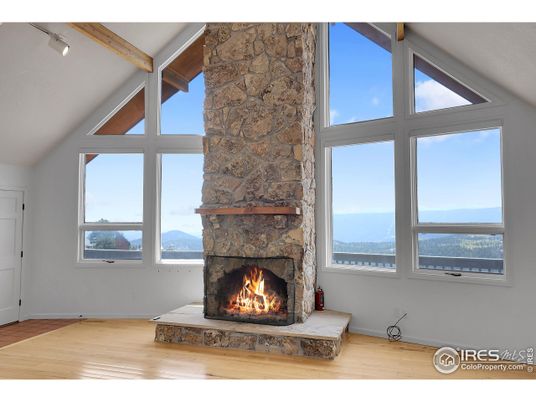 Fireplace, Interior, Stone Walls, Water, Wood Texture Flooring