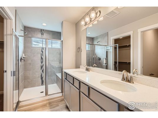 Bathroom, Dual Sink Vanities, Glass Shower, Interior, Recessed Lighting, Wood Texture Flooring