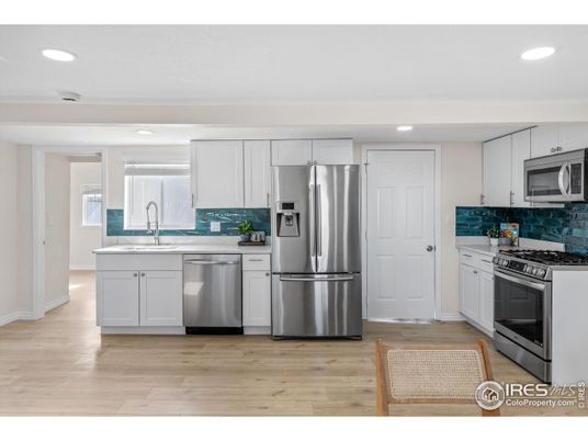 Interior, Kitchen, Recessed Lighting, Stainless Steel Appliances, Wood Texture Flooring