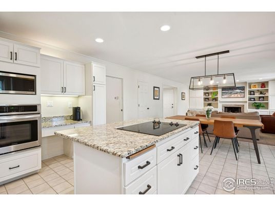 Dining room, Fireplace, Interior, Kitchen, Pendant Lights, Recessed Lighting, Stainless Steel Appliances