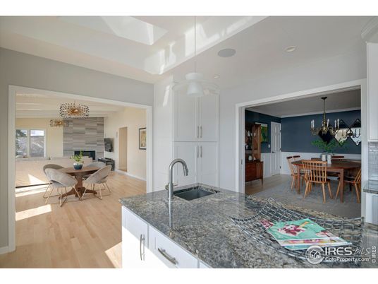 Chandelier, Dining room, Fireplace, Interior, Kitchen, Pendant Lights, Wood Texture Flooring