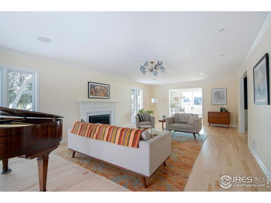 Fireplace, Interior, Living room, Piano, Recessed Lighting, Wood Texture Flooring