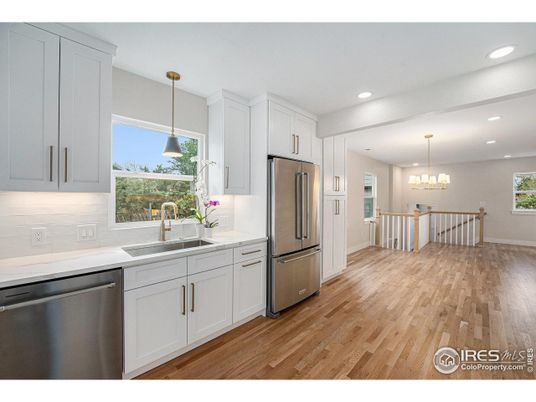 Chandelier, Interior, Kitchen, Pendant Lights, Recessed Lighting, Stainless Steel Appliances, Wood Texture Flooring