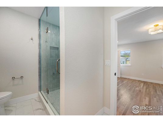 Bathroom, Glass Shower, Interior, Marble, Recessed Lighting, Wood Texture Flooring