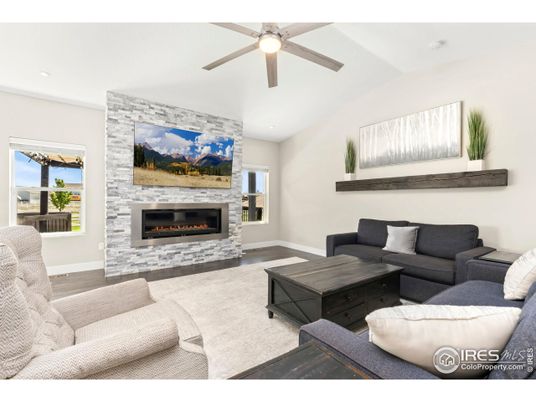Fireplace, Interior, Living room, Recessed Lighting, Stone Walls, Wood Texture Flooring