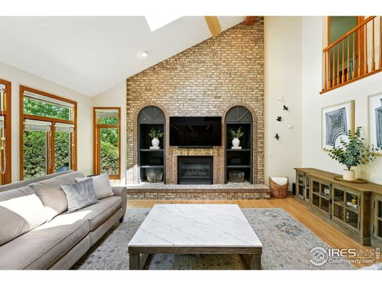 Fireplace, Interior, Living room, Recessed Lighting, Stone Walls, Wood Texture Flooring