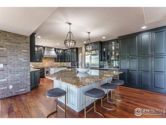 Interior, Kitchen, Pendant Lights, Recessed Lighting, Stainless Steel Appliances, Stone Walls, Wood Texture Flooring