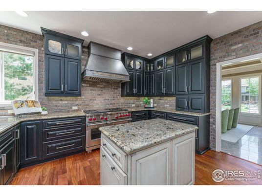 Interior, Kitchen, Recessed Lighting, Stainless Steel Appliances, Stone Walls, Wood Texture Flooring