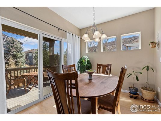 Chandelier, Dining room, Interior, Kitchen, Pendant Lights, Recessed Lighting, Stainless Steel Appliances, Wood Texture Flooring