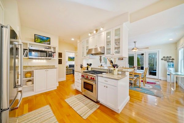 Dining room, Interior, Kitchen, Recessed Lighting, Stainless Steel Appliances, Wood Texture Flooring