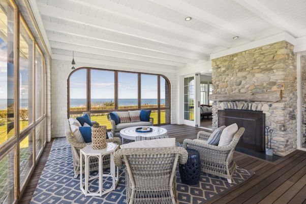 Fireplace, Interior, Living room, Recessed Lighting, Stone Walls, Water, Wood Texture Flooring