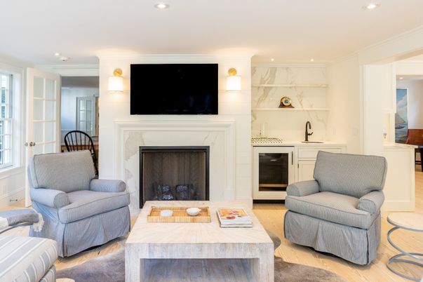 Fireplace, Interior, Living room, Marble Walls, Recessed Lighting, Wood Texture Flooring