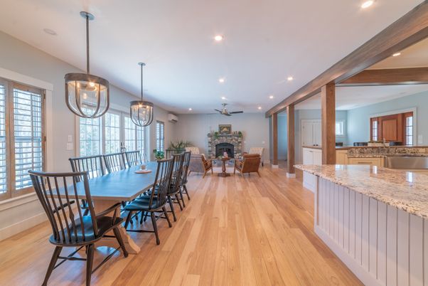 Dining room, Fireplace, Interior, Living room, Pendant Lights, Recessed Lighting, Wooden Beams, Wood Texture Flooring