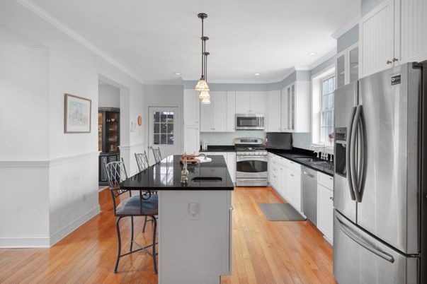 Dining room, Interior, Kitchen, Pendant Lights, Recessed Lighting, Stainless Steel Appliances, Wood Texture Flooring
