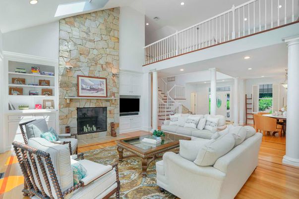 Fireplace, Interior, Living room, Recessed Lighting, Stone Walls, Wood Texture Flooring