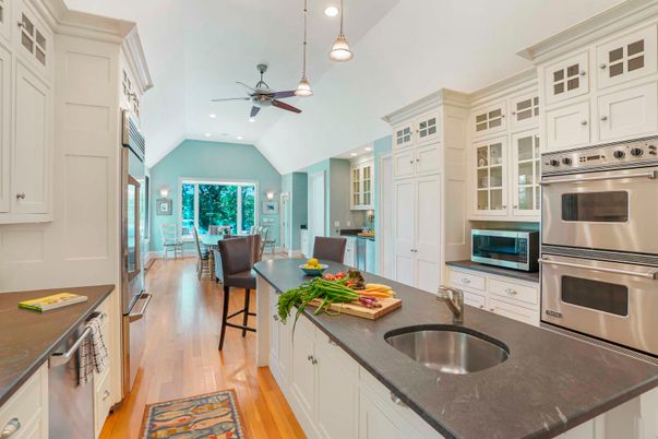 Dining room, Interior, Kitchen, Pendant Lights, Recessed Lighting, Stainless Steel Appliances, Wood Texture Flooring